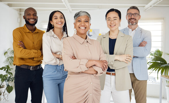 Portrait, management and arms crossed with a business team in the office for collaboration. Teamwork, diversity and leadership with a happy employee group together in their professional workplace - Powered by Adobe
