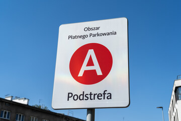 Sign indicating paid park zone A in Krakow, Poland. Road traffic information name plate for car...