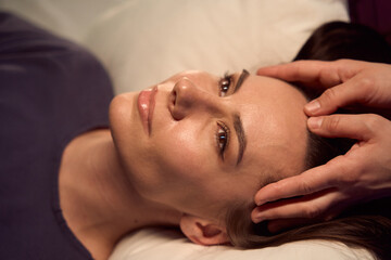 Fototapeta na wymiar Wellness center client getting relaxing scalp massage