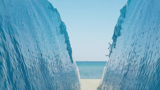 sea ​​water opening. 3d animation of sea water splitting in half. the sea of ​​the beach opening up to make a way