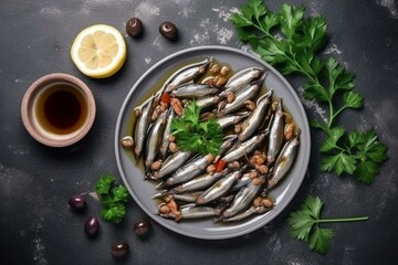 Tasty anchovy fillets accompanied by olives and parsley on a grey table, presented in a flat lay style. Generative AI