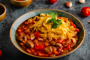 Lagman soup with lamb, homemade noodles and vegetables.