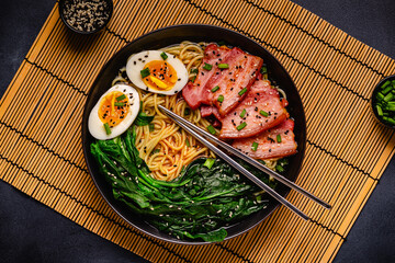 Fototapeta na wymiar Traditional ramen noodle soup with brisket, spinach and egg.