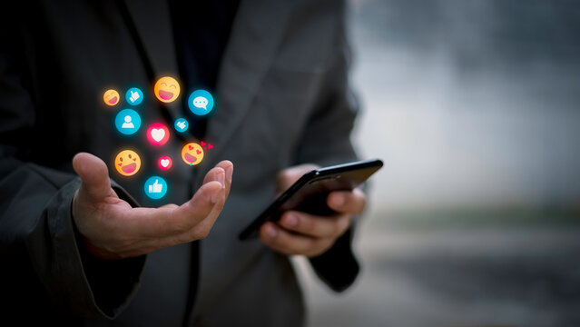 Social media and digital online concept.Social Distancing ,Working From Home concept. man using smart phone with Social media. The concept of living on vacation and playing social media.