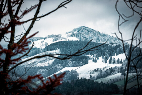 Snow covered mountain peak in black forest