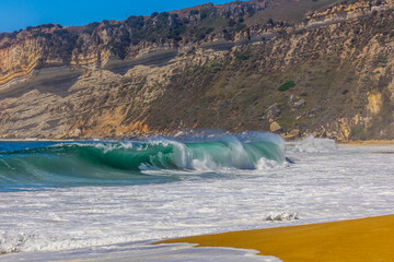 Nazare beach in Portugal, home of oonw of the biggest waves in the world. Nazare bi waves beach