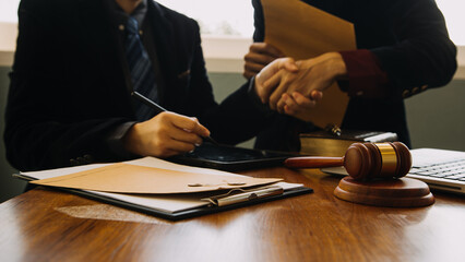 Businessman and Male lawyer or judge consult having team meeting with client, Law and Legal services concept.