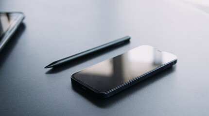 Open laptop with digital tablet and white smartphone. All with isolated screen on old wooden desk.