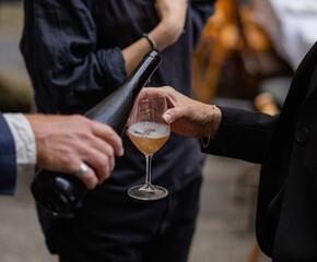 waiter serving wine