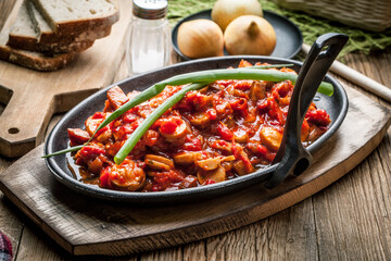Lecho - stew with peppers, onions and sausages.
