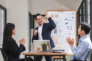 Asain business team Happy to be successful partnership teamwork achieved the desired goal