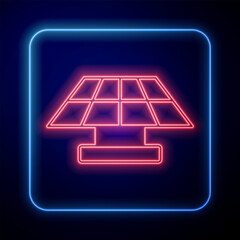 Glowing neon Solar energy panel icon isolated on black background. Vector