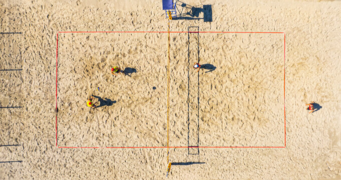 Top view of the volley ball court during game. Aerial view of playing volleyball