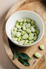 Bowl of green fava beans.
