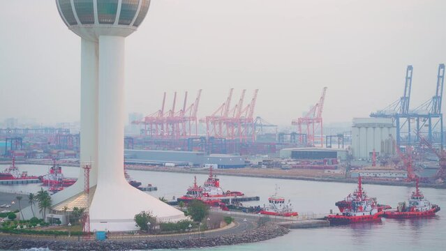 Jeddah, Saudi Arabia - Mar 08 2023, 4k, panoramic aerial view, Port cranes and many containers in the port city of Jeddah, Saudi Arabia