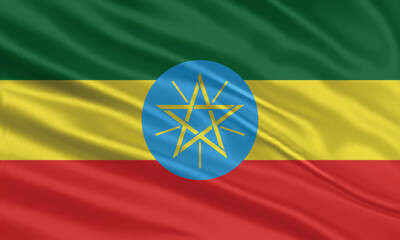 Ethiopia flag design. Waving Ethiopia flag made of satin or silk fabric. Vector Illustration.