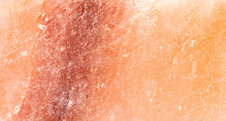 Himalayan salt stone closeup background, texture of natural pink salt crystal