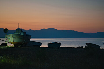 dark sunset silhouette at sea 