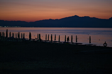 dark sunset silhouette at sea 