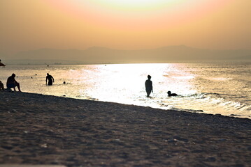 dark sunset silhouette at sea 