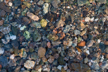 pebbles, stones on the beach, in the sea