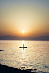 dark sunset silhouette at sea 