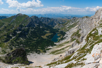Panoramic views on the rocky mountain landscapes from a hike from the Sedlo Pass to the peak of Bobotov Kuk, Montenegro