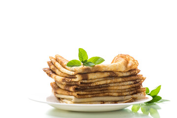lot of pancakes thin pancakes in a plate, on white background.