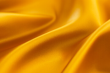 golden silk textured fabric surface