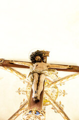 Jesus figure hanging on a cross in a Scandinavian Christian churchccc