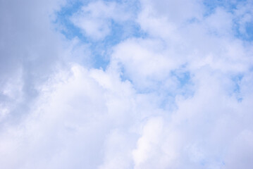 Photo of blue sky and white clouds, bright image. Background.