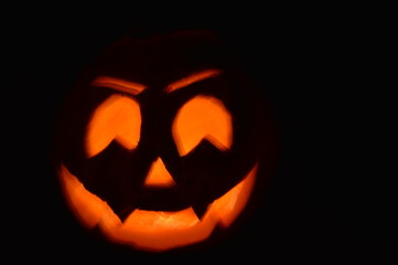 Abstract Halloween carved pumpkin in motion steam black cat and Jack-o-Lantern 