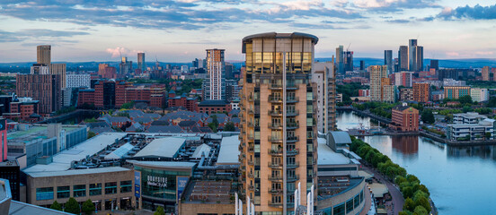 Manchester Skyline viewed from Salford quays at sunset