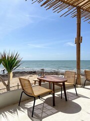 table and chairs on the beach