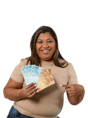 woman holding money, smiling woman holding and pointing to Brazilian money, 