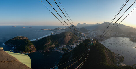 Rio de Janeiro, Brazil: Sugarloaf Cable Car and panoramic view of the city skyline with the beaches...