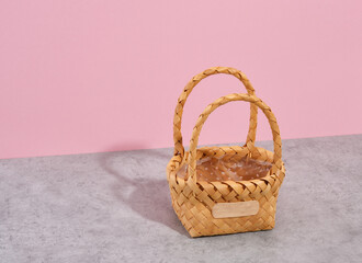 A beautiful wicker decorative basket for flowers, vegetables or fruit. Copy space for text.