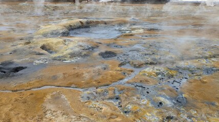 Sulfur-hot geysers at Hverir in Iceland in a natural outdoor setting
