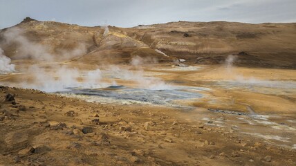 Sulfur-hot geysers at Hverir in Iceland in a natural outdoor setting
