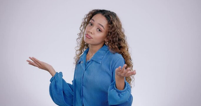 Face, shrug and woman with doubt, confused and questions on a white studio background. Portrait, person and model with body language, gesture and review with feedback, why and emoji with reaction
