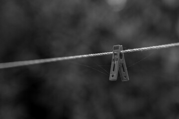 Fototapeta na wymiar clothespins on rope