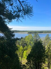 Scenic view of Juniper Valley in Kaunas, Lithuania, with rolling hills and lush green trees