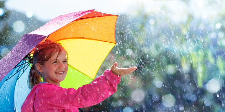 Happy Child With Umbrella Under Rain - Joy And Laughing With Autumn Shower