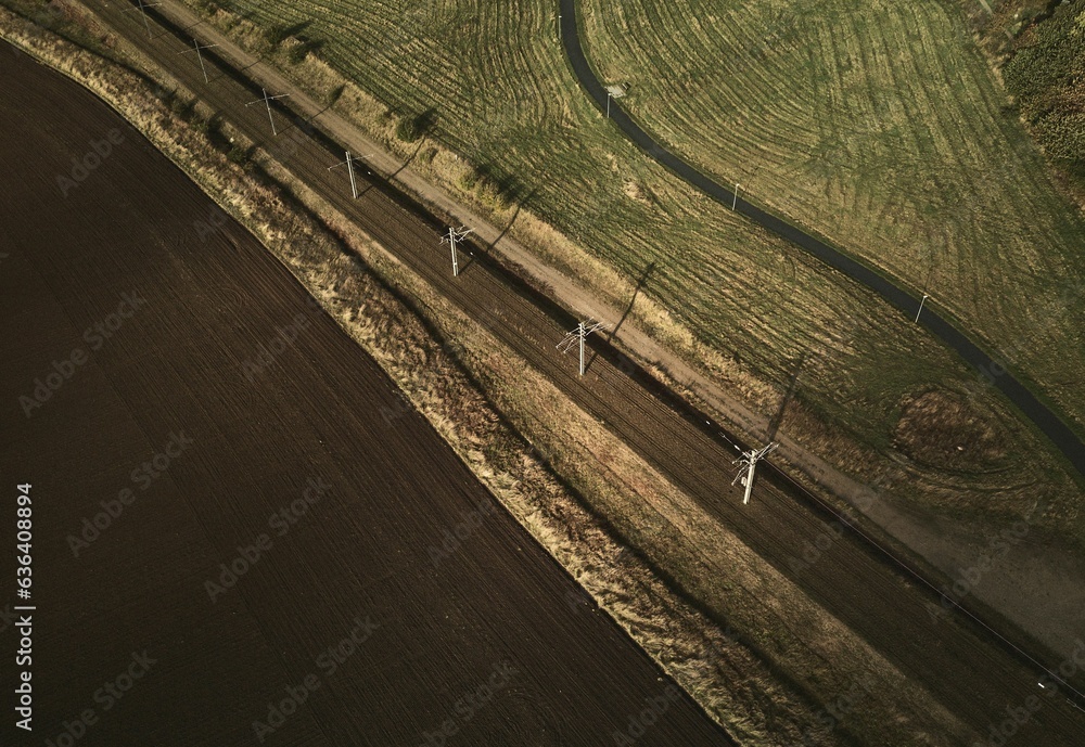 Poster an aerial shot of an empty open field