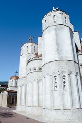 Church of the Three Holy Hierarchs in Skopje, North Macedonia. White stone Orthodox Church.