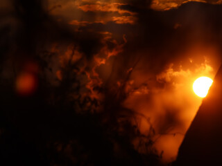 Silhouette of a house at sunset