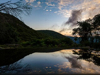 Aerial view of the Hudson River with Storm King Mountain in Upstate New York at sunrise - obrazy, fototapety, plakaty