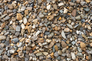 Small Stones Pebbles Gravel texture background. Full Frame.