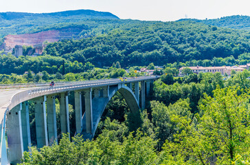 A view across the road bridge on the outskirts of the town of Solkan in Slovenia in summertime © Nicola