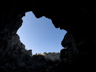 texture of the big window opening from the cave to the sky